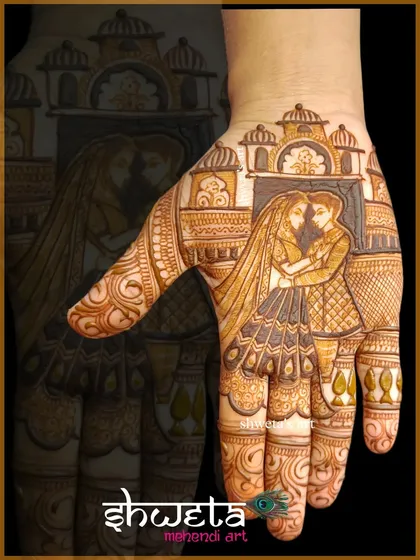A close-up of my couple portrait work. I focus on capturing the likeness and emotion of the couple, creating a personalized centerpiece for your bridal mehendi that you will cherish.