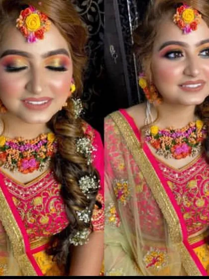 A close-up of a gorgeous Mehndi look. The colorful eyeshadow with a pop of yellow and pink perfectly matches her floral jewelry and bright outfit, creating a fun and festive style.