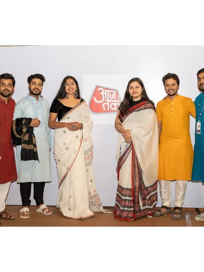 A group photo with the team and organizers at the AajTak event.