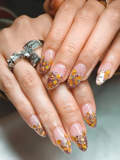 A gorgeous glitter gradient using a mix of gold and bronze hexagonal glitter. The warm tones make this a perfect look for the festive season or a late summer evening.