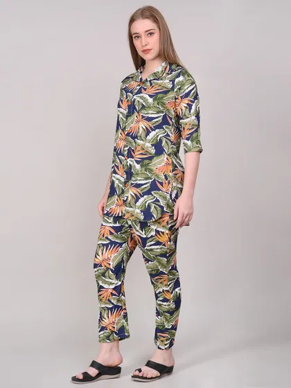 A static side view of the tropical print set, offering a clean look at the outfit's silhouette.
