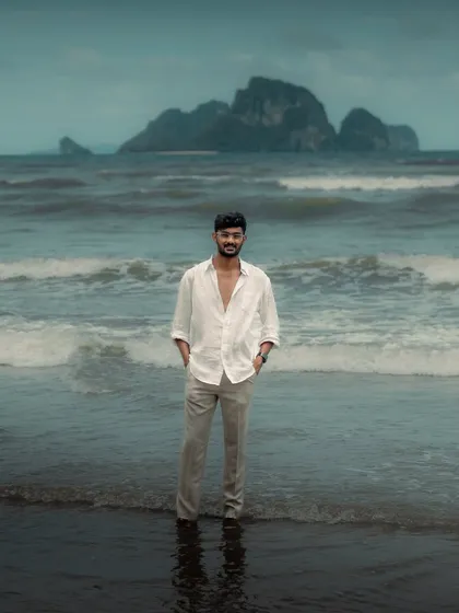 A self-portrait on a beach in Krabi. Even though I missed my flight, this solo journey gave me so much more in return.