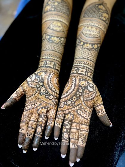 A beautiful engagement design for Siddhi, with flowing paisley patterns that create a sense of movement.