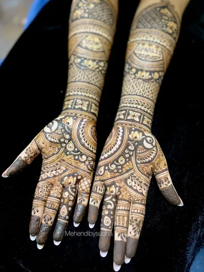 A beautiful engagement design for Siddhi, with flowing paisley patterns that create a sense of movement.