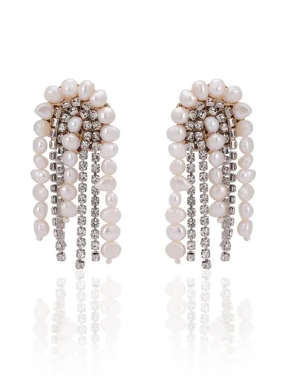 These new danglers combine freshwater pearls and crystal chains for a look that is both classic and modern.