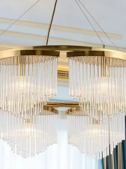A grand chandelier with curtains of glass rods, creating a luxurious waterfall effect. This is an ideal choice for a formal space with high ceilings.