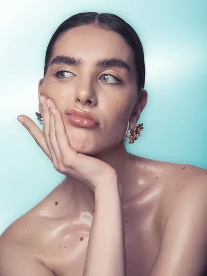 Even with a fun, quirky expression, the makeup remains flawless. This shows the durability and finish of the products I use, ensuring the look stays perfect throughout a long shoot.