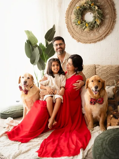 The whole family means the whole family, furry members included. I absolutely love when you bring your pets along. These two good boys were the perfect addition to this beautiful family portrait in my boho-themed studio setup.