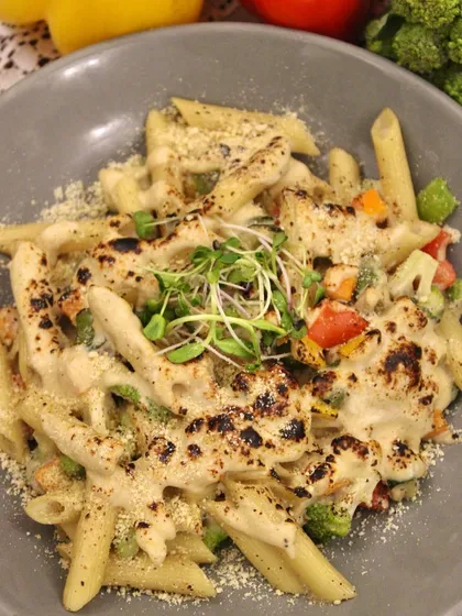 Our weekend special Baked Pasta is bursting with fresh veggies and the creamy goodness of our cashew and parmesan cheese. It's a heavenly, scrumptious Italian dish baked to golden perfection.