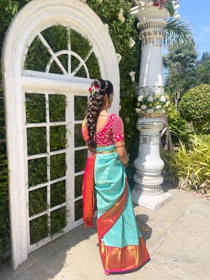 Duplicate of 19, showing the back view of the hairstyle.