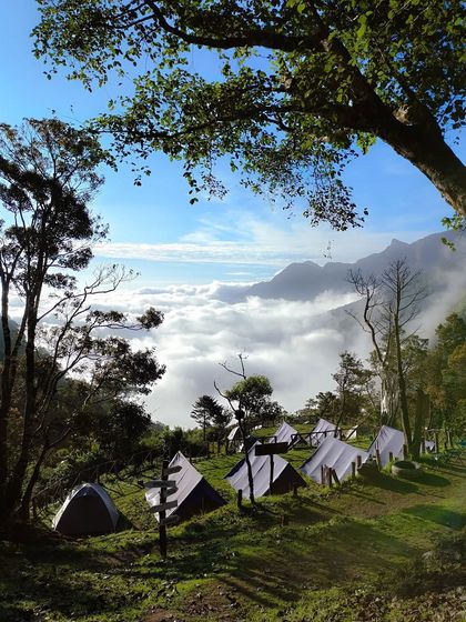 A duplicate shot of the campsite on a clear day, high above the clouds.