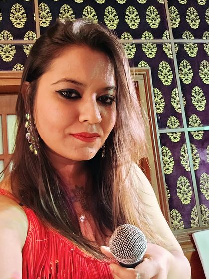 Our female vocalist, ready to mesmerize the audience at a corporate event for Axis Bank at The Zuri Kumarakom.