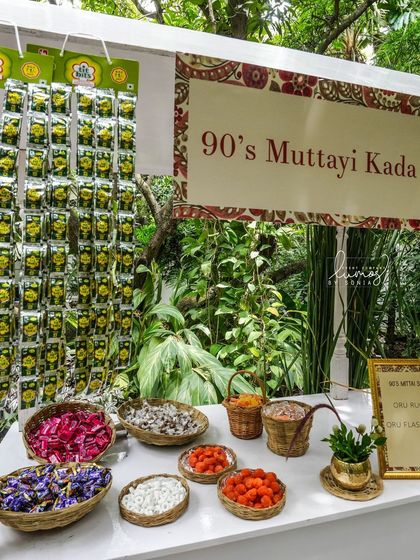 A nostalgic '90s Muttai Kada' (candy shop) at a wedding, filled with classic Indian sweets from the couple's childhood.
