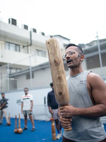 An instructor with a headset microphone leads an L1 certification class. This image shows the professional and structured environment of our training programs, designed for serious learners.