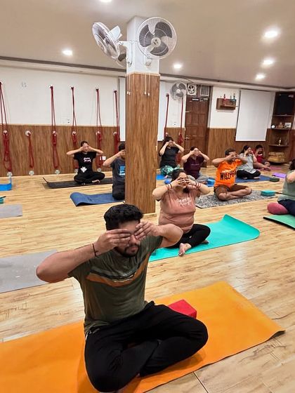 Another view of our class practicing Brahmari Pranayama. The collective hum creates a powerful vibration that resonates through the studio, promoting a deep sense of peace.