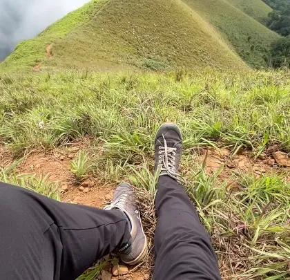 A first person view of relaxing on the grassy slopes of Netravati Peak. Sometimes the best part of a trek is just sitting down and feeling the earth beneath you.