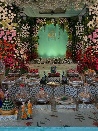 Another view of the stunningly dense floral stage, showing the sheer volume of flowers used.
