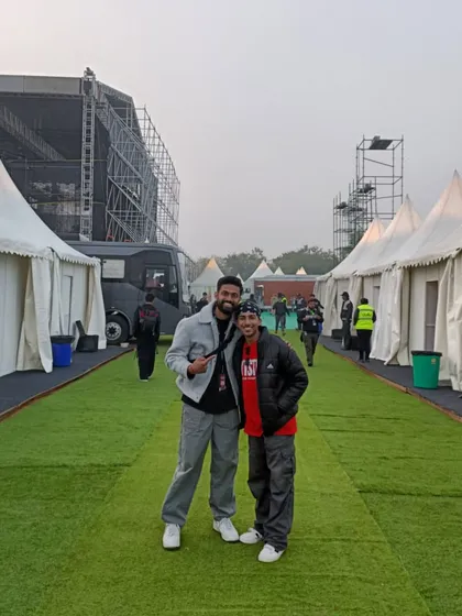 Behind the scenes at the concert. This is the calm before the storm, posing with the crew backstage before hitting the lights. It's all about the journey and the people you share it with.