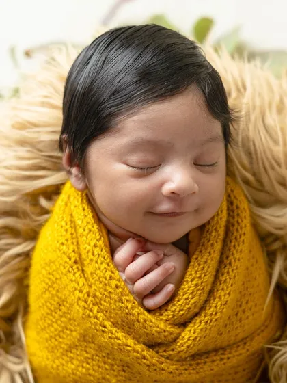 There is nothing more precious than a newborn's smile. My newborn sessions are designed to be calm and gentle, capturing those fleeting, peaceful moments while your baby dreams.