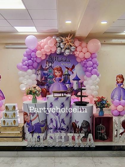 A lovely Sofia the First themed birthday party. We used a purple and pink color scheme with a castle backdrop, character cutouts, and themed pedestals to bring the princess's world to life.