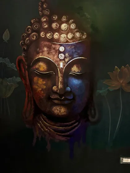 Art can bring a sense of peace and tranquility. For this serene Buddha portrait at a tattoo studio in Kannur, we blended rich colors with delicate gold foil details. This piece highlights our ability to work with mixed media to create art with depth and soul.
