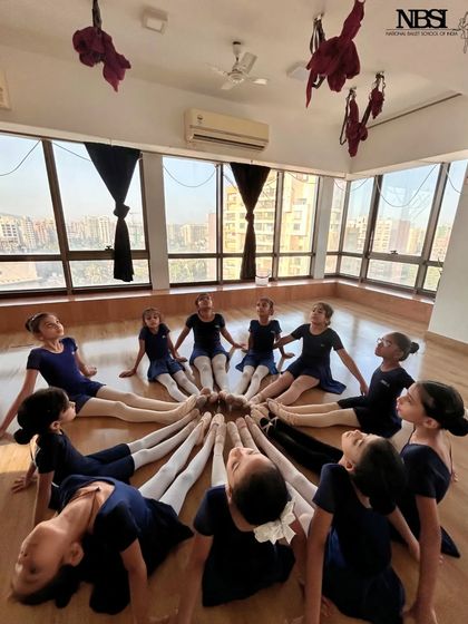 The cutest circle of ballerinas. This is a common sight in our studio, a moment of connection and friendship.