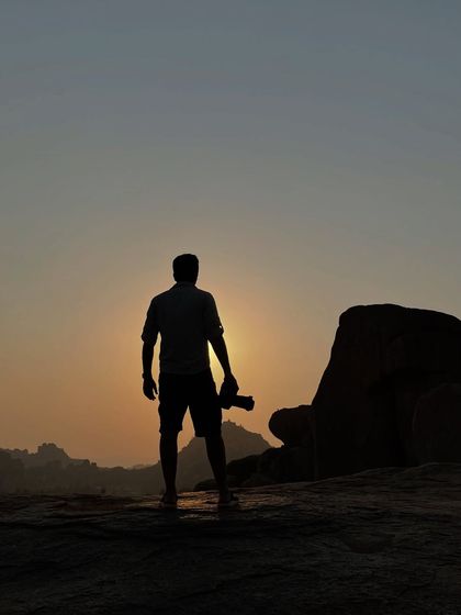 Watching the sunset after a long day of photography. The quiet moments in nature are just as important as the dramatic sightings.