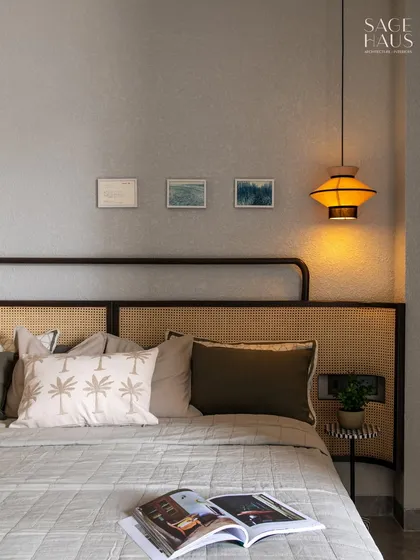 A soft palette, woven textures, and just the right glow. This bedroom was designed to feel calm and grounded, from the rattan headboard to the sculptural pendant light. Every detail plays a quiet note in a restful symphony.
