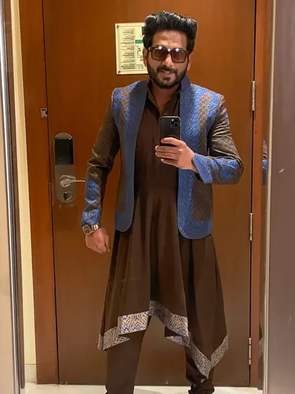 My 'Andaaz-e-Sufi' look. This asymmetrical brown kurta paired with a textured blue jacket is a modern interpretation of traditional Sufi attire.