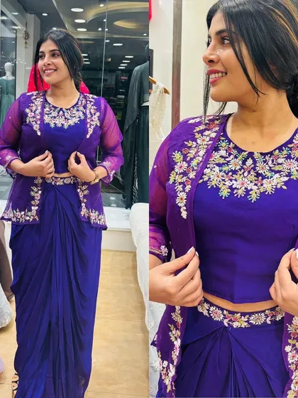 A beautiful purple Indo-Western outfit with a drape skirt and a hand-embroidered organza jacket.