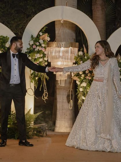 A beautiful moment between the bride and groom during their cocktail night dance. We focus on creating connections through movement.