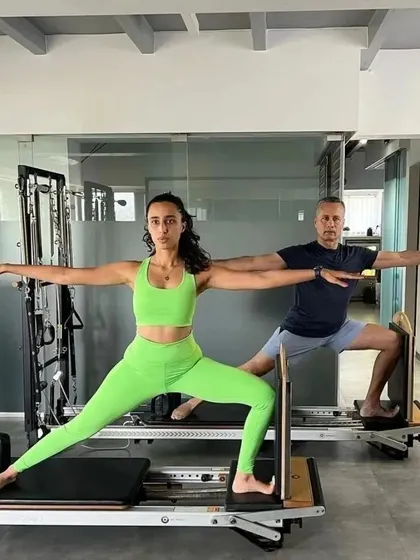 With my father and mentor, Samir Purohit. As the pioneers who brought Pilates to India, we have built a community trusted by top celebrities and athletes for its expertise and results.
