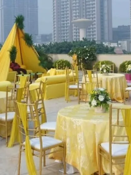 This view shows the guest seating area for the Haldi function. I used yellow table linens and chair ties to maintain the vibrant color scheme throughout the entire venue.