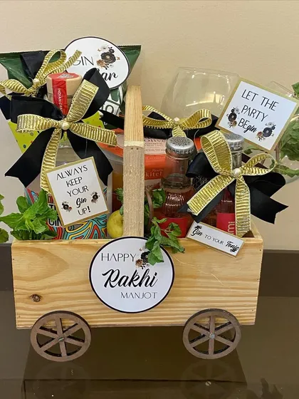 Let the party be-GIN. This Rakhi, gift your sibling a bespoke gin-themed cart, complete with gin miniatures, tonic water, snacks, and fresh mint.