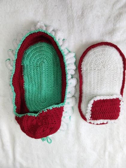 The components of the travel bed set laid out. You can see the main bed structure and the soft, removable mattress with its small attached pillow.