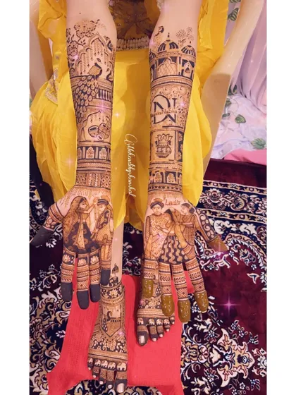 A full view of the bride's hands and feet, showcasing the cohesive design with family portraits on the arms.