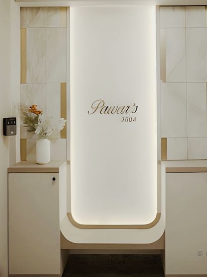 The entrance to this home at Sai World Empire features a custom-designed shoe cabinet with a backlit panel. It’s a beautiful and practical solution that makes a great first impression.