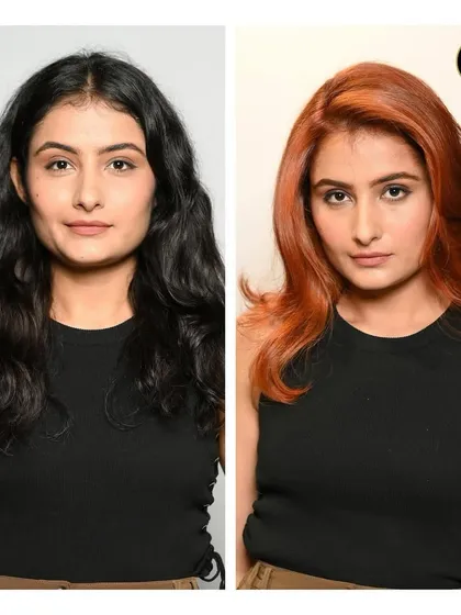 A dramatic before and after that showcases the power of a bold color change. We transformed her dark hair into a fiery, radiant copper red, complete with a stylish blowout that adds volume and movement. This is our global hair color service at its best.
