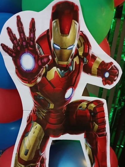 Detail of the Iron Man cutout used in the Avengers-themed decoration.