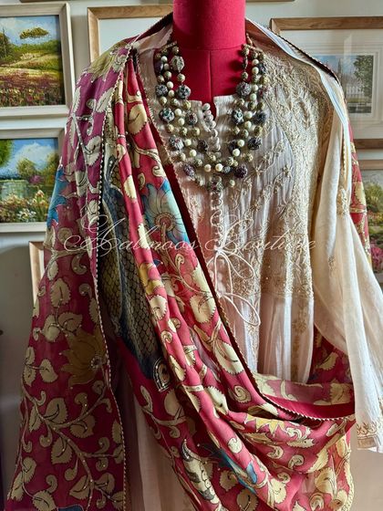 A full-length view of the Anarkali styled with the Kalamkari dupatta, presenting a complete, regal look.