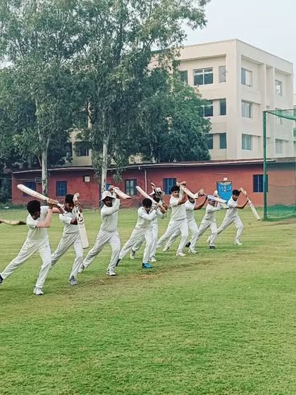 The entire squad practicing their shots together. This builds team cohesion and reinforces coaching instructions.