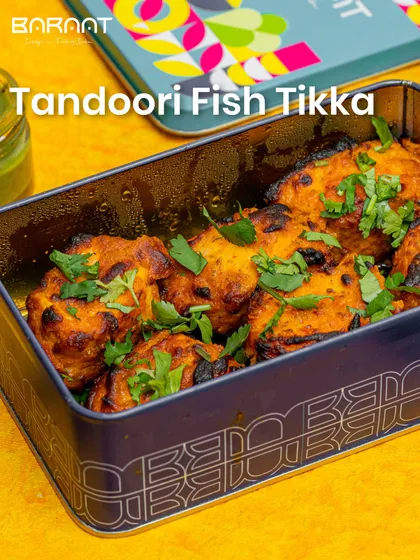 My Tandoori Fish Tikka, marinated in spices and grilled, is delivered in our signature tin box to keep it warm and fresh.