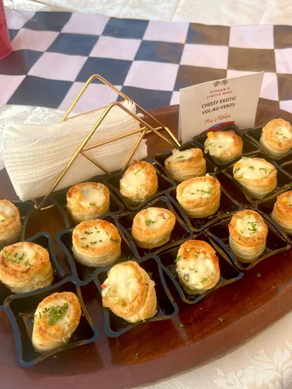 Cheesy Exotic Vol-au-vents, a classic French appetizer. The flaky puff pastry is filled with a creamy mixture of cheese and finely chopped exotic vegetables.