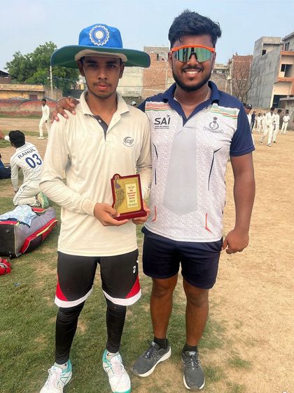 Arman Ali with his award after a match-winning knock of 114 not out.