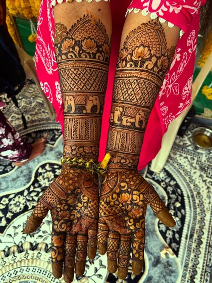 For my traditional Hindu brides, I create designs rich in cultural symbolism. This piece features classic elephant motifs and intricate patterns, perfect for traditional wedding ceremonies.