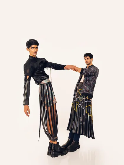 An editorial shot for designer Siddhant Agrawal's "Monsieur" collection. This image showcases my ability to style avant-garde menswear, using dynamic posing and unconventional silhouettes to create a visually arresting fashion statement.