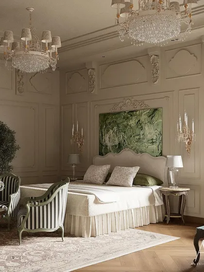 A traditional and timeless look is achieved in this bedroom with ornate wall mouldings and classic striped armchairs. The abstract green artwork above the bed adds a fresh, contemporary touch to the otherwise classical design.
