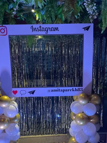 A fun, custom Instagram frame photobooth, complete with the birthday host's handle, provides a great interactive element for guests.