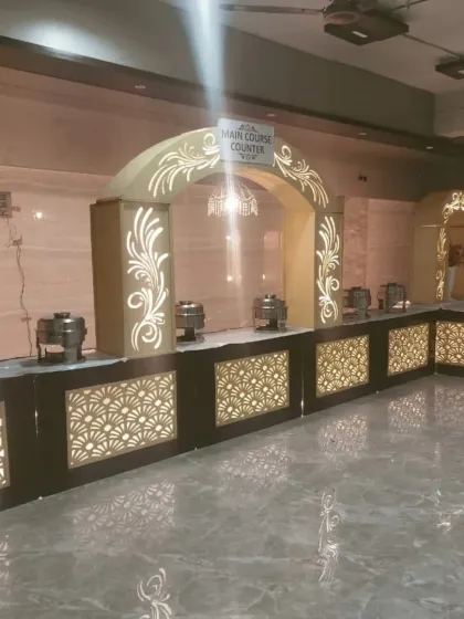 The full view of our new, elegant main course counter before the guests arrive. This setup was for a large wedding, designed to handle a crowd of 950 people efficiently.