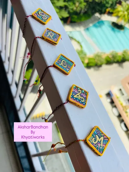 My 'AksharBandhan' Rakhis are a special part of my collection. Each one is hand-painted with a brother's initial, making it a truly personal and vibrant gift of love that sells out every year.